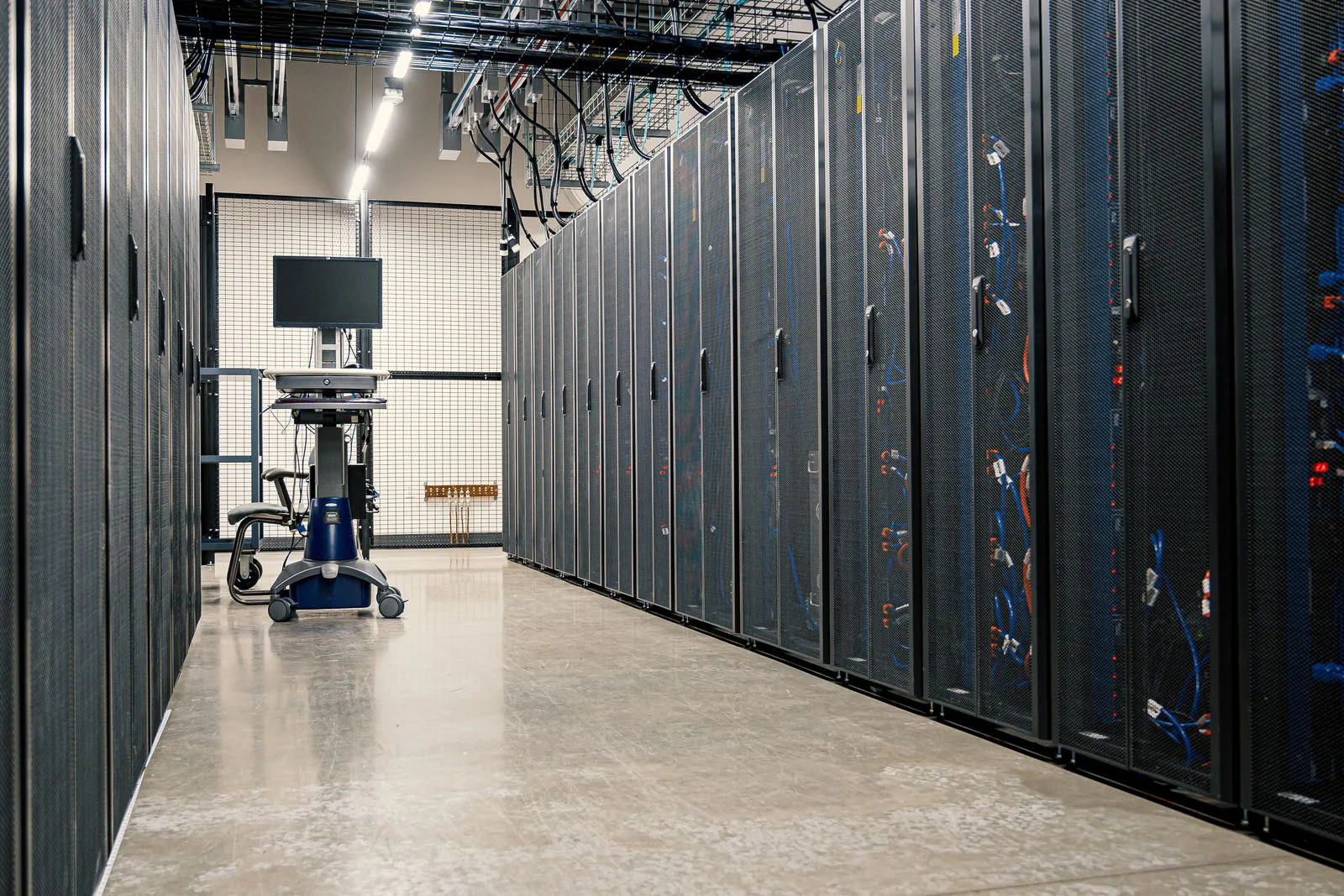Server racks in a data centre corridor